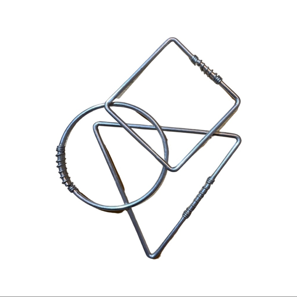 Set of three aluminum bracelets